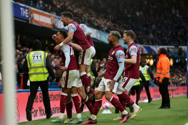 Aston Villa players celebrating their win