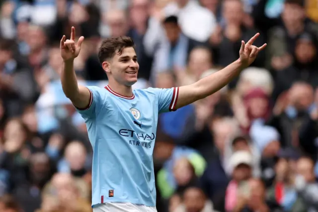 Julian Alvarez of Man City celebrates scoring against Liverpool.