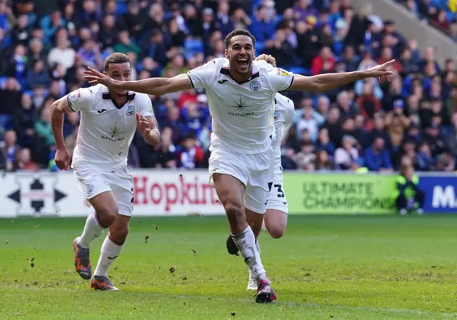 Ben Cabango celebrates scoring Swansea's winner at Cardiff