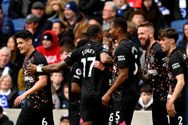 Pontus Jansson of Brentford celebrates with teammates after scoring the team's first goal during the Premier League match