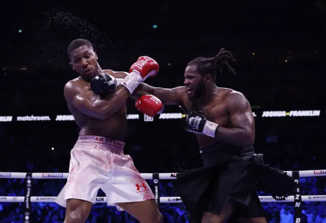 Anthony Joshua gets punched