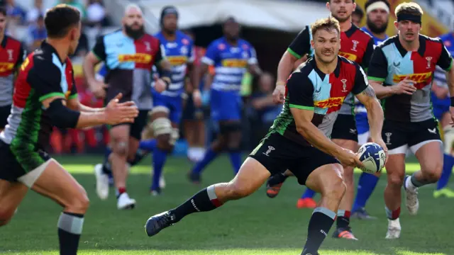 Harlequins attempt a pass against Stormers