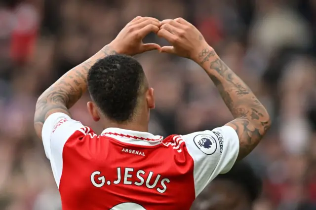 Gabriel Jesus putting up a heart sign for the crowd