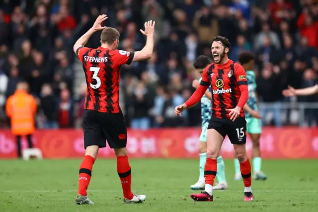 Adam Smith and Jack Stephens of AFC Bournemouth celebrate after the team's victory