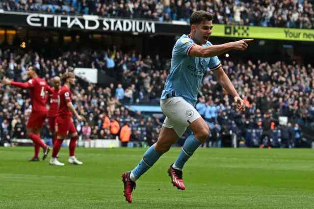 Julian Alvarez celebrates scoring against Liverpool.