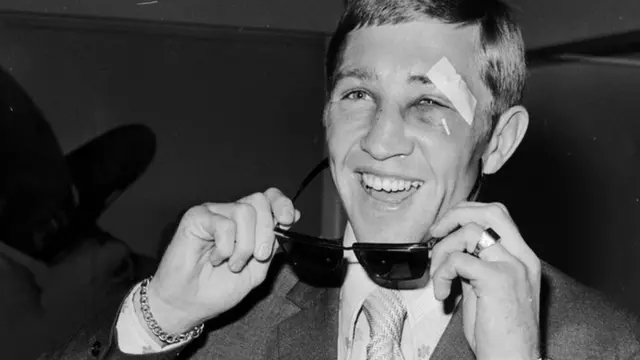 Ken Buchanan removes his sunglasses on his arrival at London's Heathrow airport, to show his cuts and bruises after the successful 1971 defence of his world lightweight crown against Panama's Ismael Laguna in New York