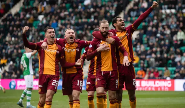 Motherwell's Kevin van Veen (centre) celebrates scoring a penalty to make it 2-0 during a cinch Premiership match between Hibernian and Motherwell at Easter Road