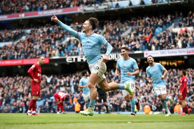 Jack Grealish celebrates scoring against Liverpool.