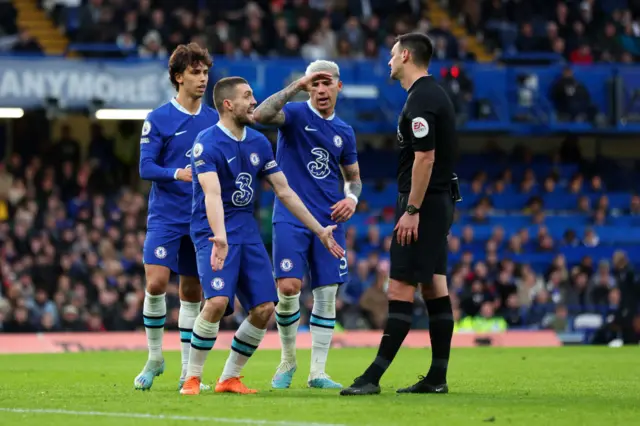 Mateo Kovacic, Joao Felix and Enzo Fernandez of Chelsea appeal to referee, Andrew Madley for a penalty