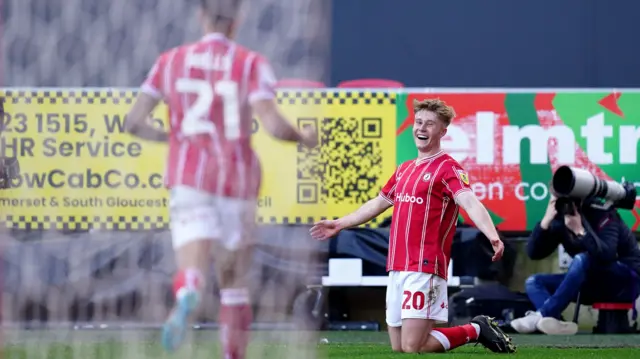 Sam Bell celebrates