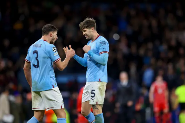 Ruben Dias and John Stones