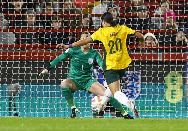 Sam Kerr scores past England keeper Mary Earps.