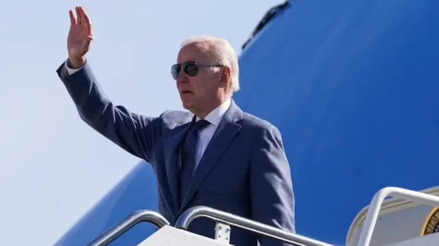 Biden speaking to reporters before flight