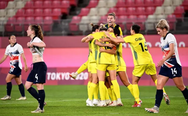 Australia celebrate beating Team Gb to qualify for the semi-final of the Olympics.