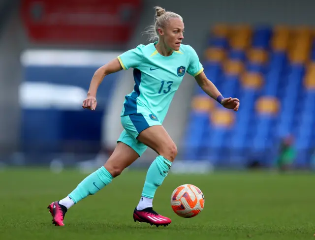 Australia midfielder Tameka Yallop plays against Scotland.