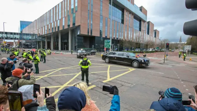 President Biden's motorcade drives away from Ulster University