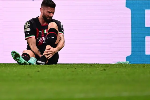 AC Milan striker Olivier Giroud struggles with an ankle injury