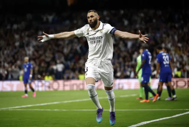 Real Madrid striker Karim Benzema celebrates scoring against Chelsea