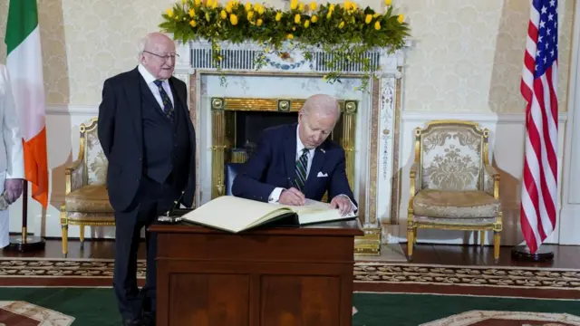 Joe Biden signing a book