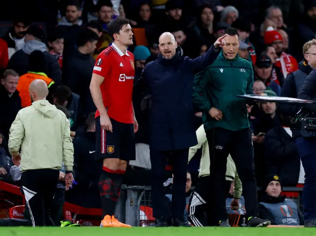 Manchester United manager Erik ten Hag gives instructions to Harry Maguire before he comes on as a substituteManchester United manager Erik ten Hag gives instructions to Harry Maguire before he comes on as a substitute