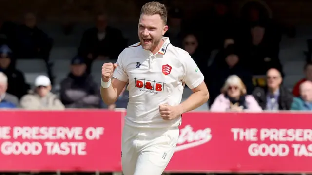 Sam Cook celebrates wicket