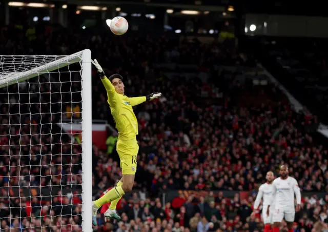 Sevilla's Bono watches a cross drift over his bar