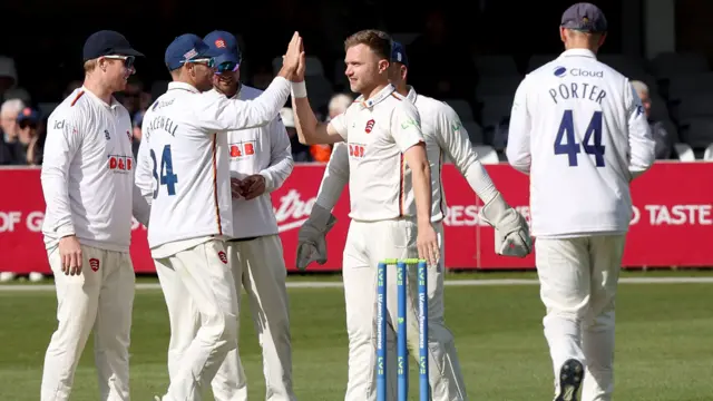 Sam Cook celebrates a wicket