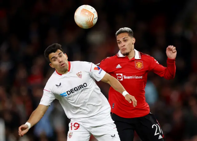 Manchester United's Antony in action with Sevilla's Marcos Acuna