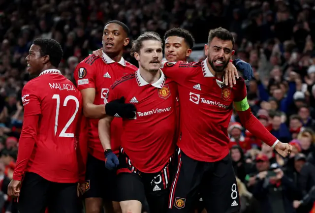 Marcel Sabitzer and Bruno Fernandes celebrate the former giving Manchester United the lead against Sevilla in the Europa League quarter-finals