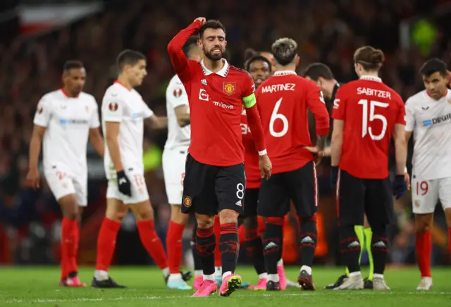 Manchester United's Bruno Fernandes reacts after being shown a yellow card