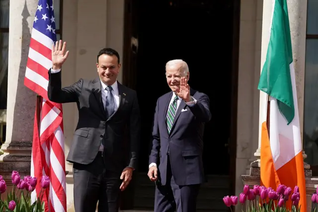 President Joe Biden and Taoiseach Leo Varadkar waving outside Farmleigh House