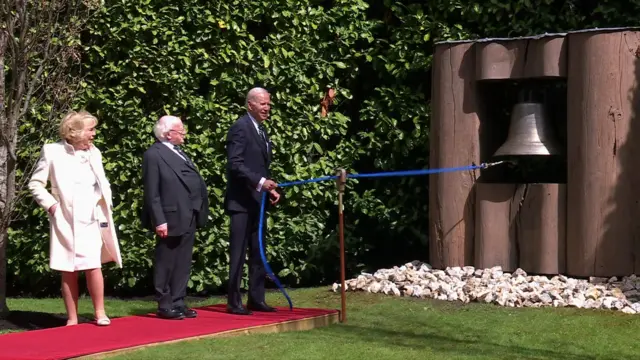 Joe Biden rings the Peace Bell