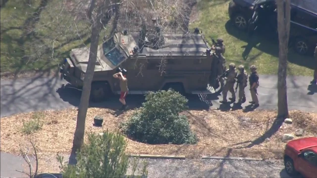 Jack Teixeira being taken into custody outside his family home earlier today