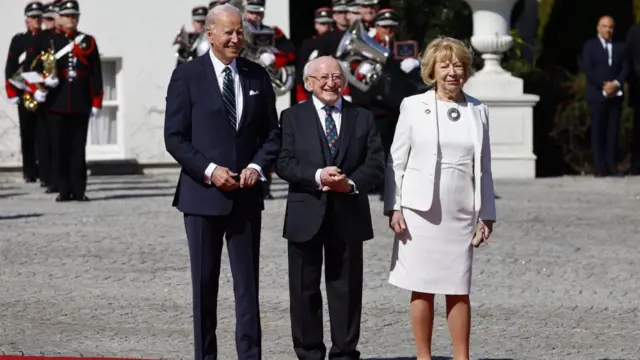 President Biden was greeted by Irish President Michael D Higgins and his wife Sabina