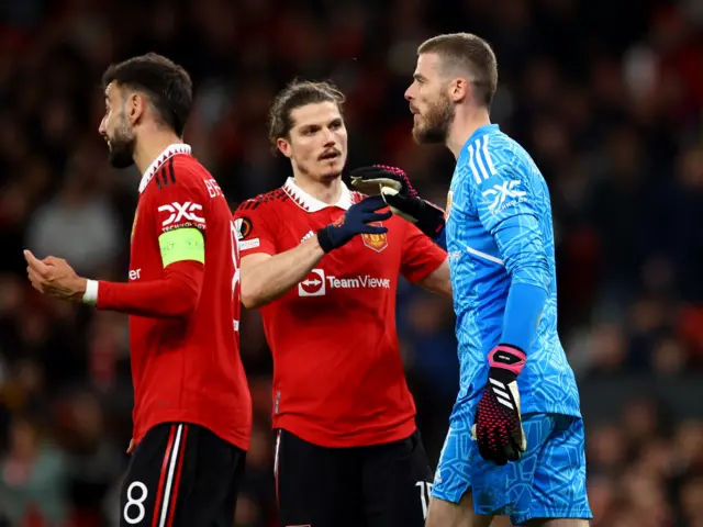 Marcel Sabitzer congratulates David de Gea for a save