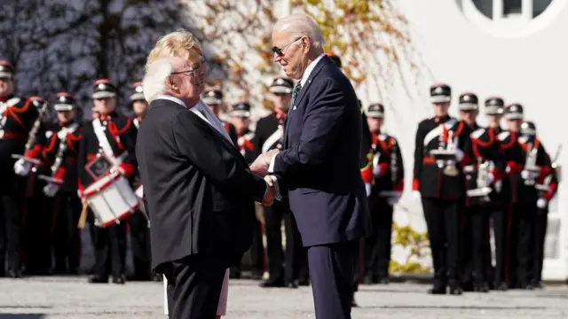 Joe Biden shakes hand with Michael D Higgins