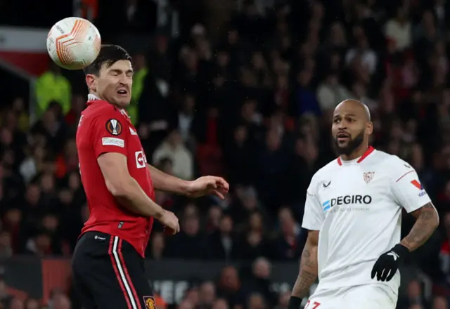 Manchester United's Harry Maguire scores an own goal and Sevilla's second