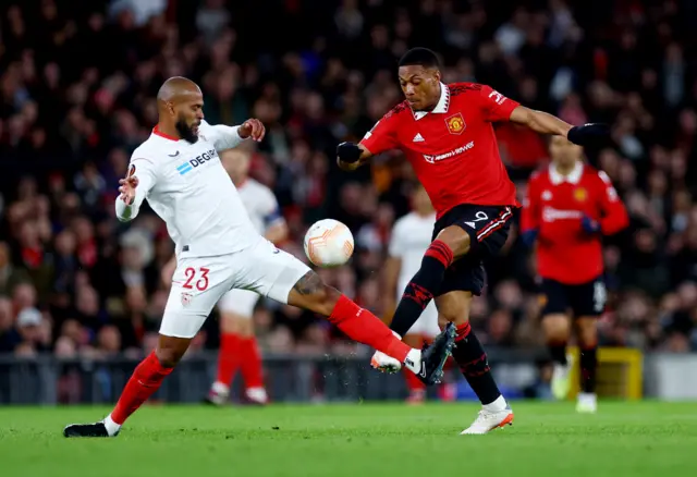 Manchester United's Anthony Martial in action with Sevilla's Marcao