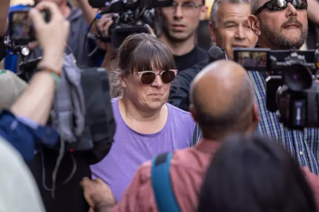 A couple believed to be Dawn and Thomas Dufault outside court in Boston