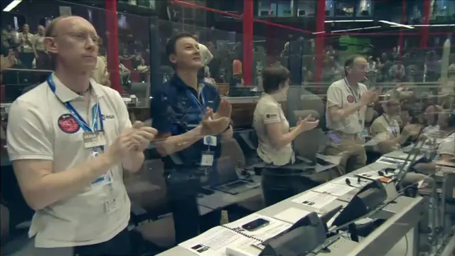 Applause in ESA the second it was announced that the completion was successful