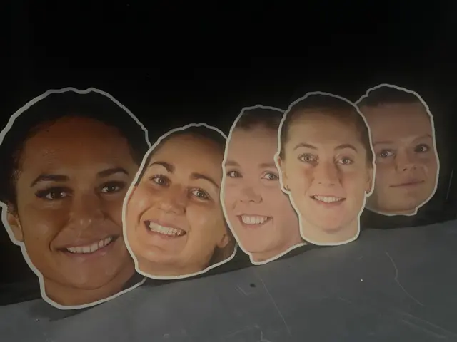 Cardboard faces of British players