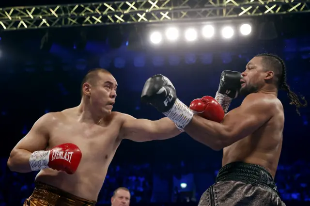 Joe Joyce is punched by Zhilei Zhang