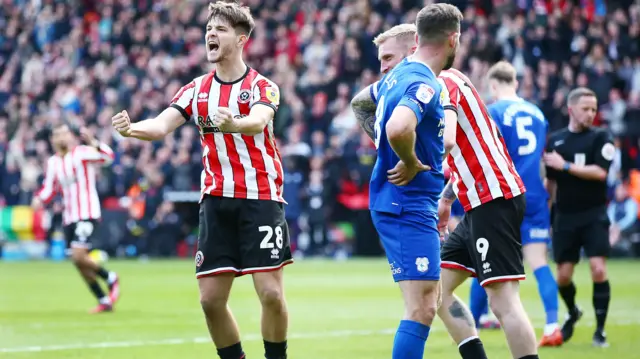 James McAtee celebrates