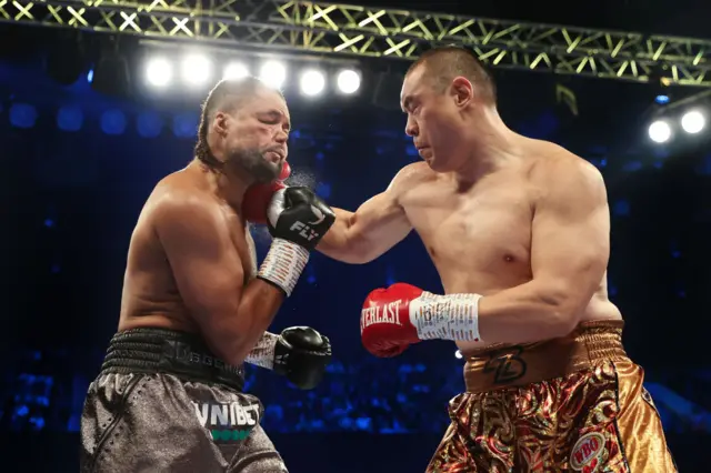 Joe Joyce is punched by Zhilei Zhang