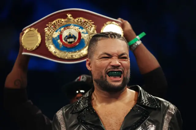 Joe Joyce enters the ring with his belt