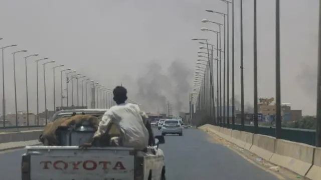 Smoke rises in Omdurman, near Halfaya Bridge, during clashes between the Rapid Support Forces and the army as seen from Khartoum North, Sudan, on 15 April 2023