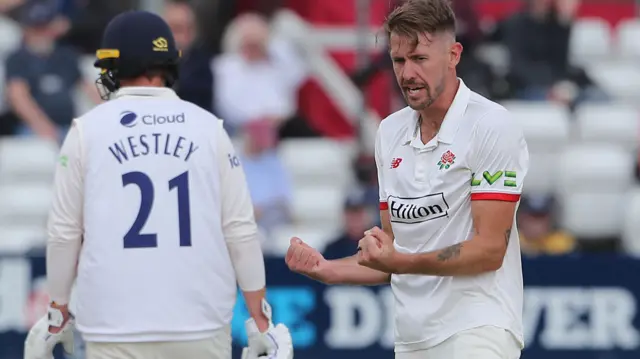 Tom Bailey celebrates wicket