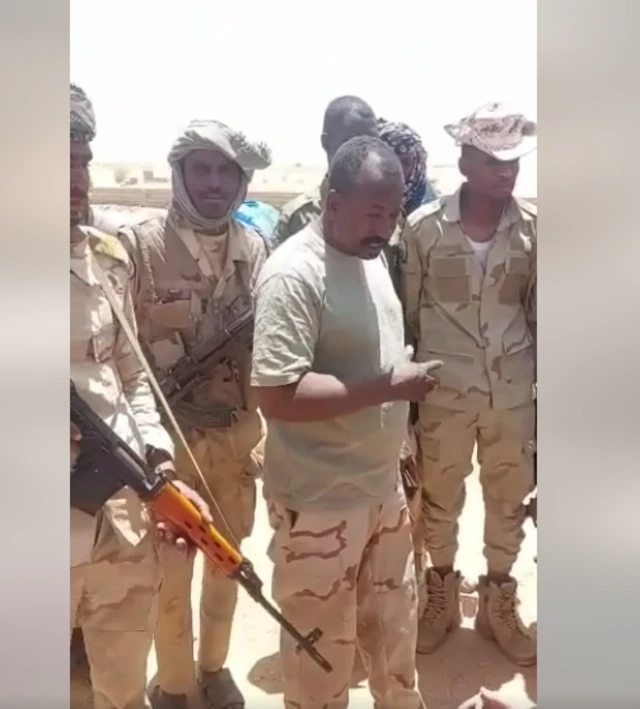 Still image from video showing RSF fighters along with capture Egyptian troops.