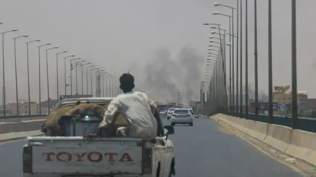 Rising smoke over Omdurman