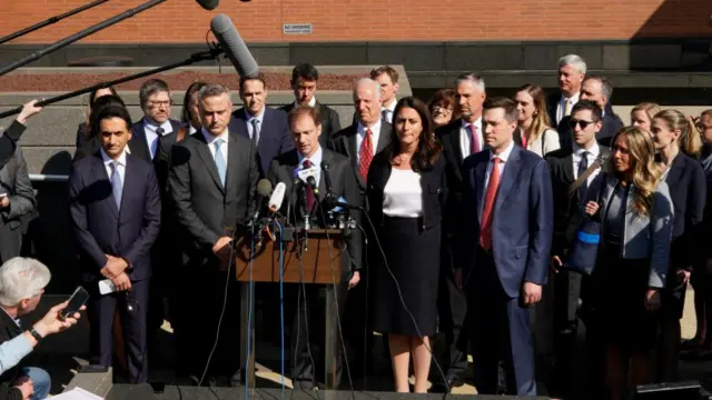 Dominion lawyers outside court